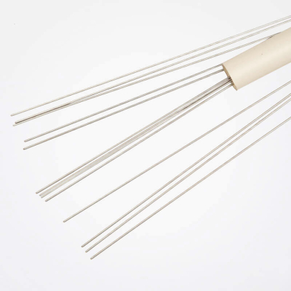 Tub med spännwire och nålar för blockning