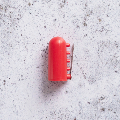 Garnfördelare och stickfingerborg