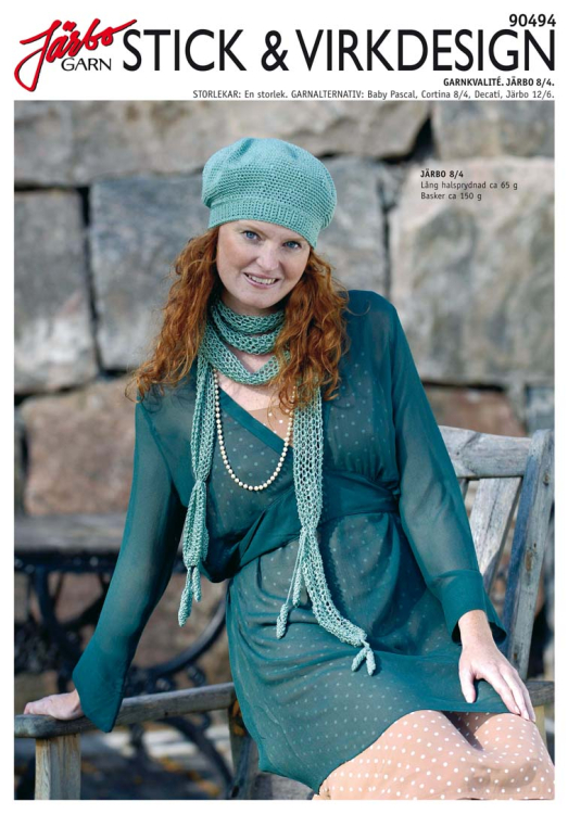 Stickad lång halsprydnad med virkade detaljer och virkad basker