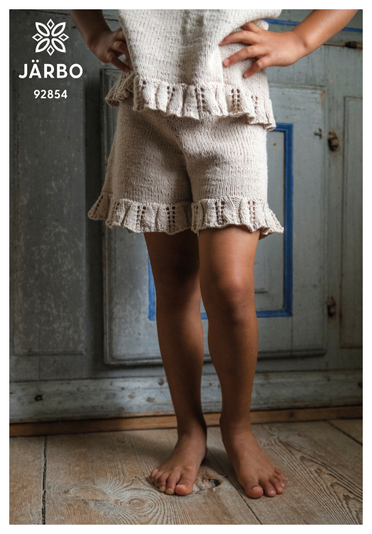 Mönster - Äng - stickade barnshorts med volang | Eddna SE