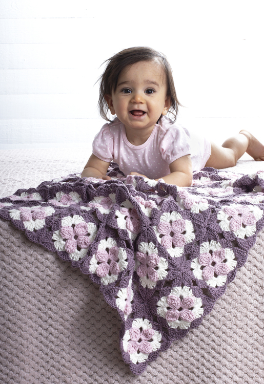 Cosmos - virkad babyfilt med rutor