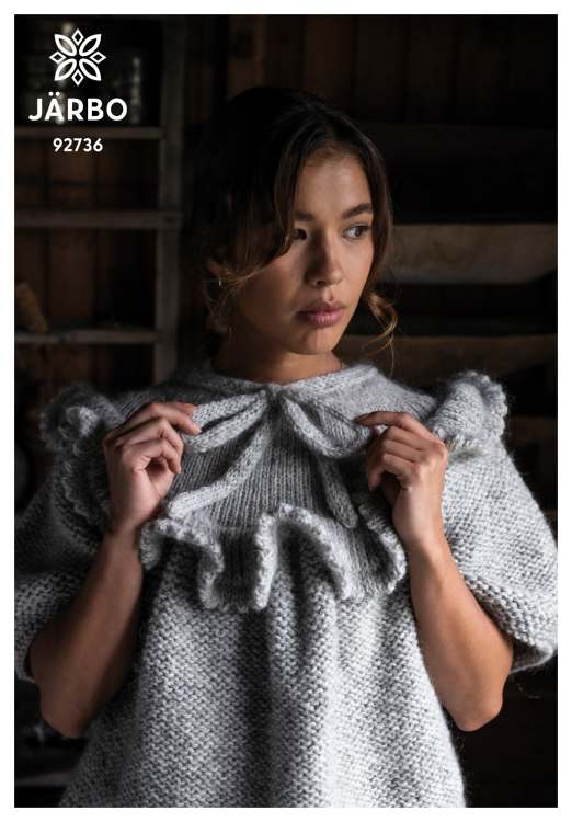 Ranunkel - stickad topp med rosett